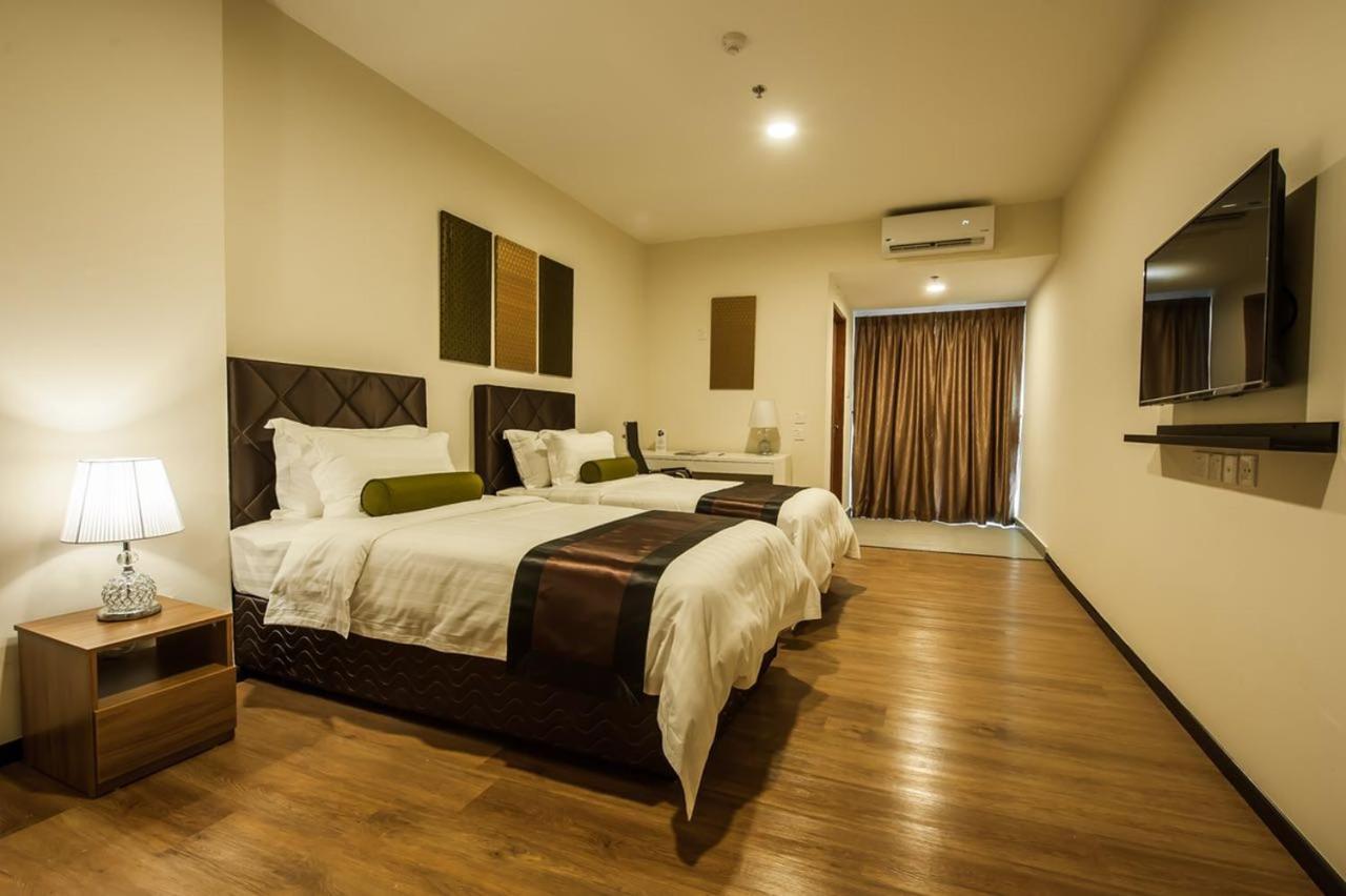 Aman Hills Hotel Kampong Timbunan Bagian luar foto